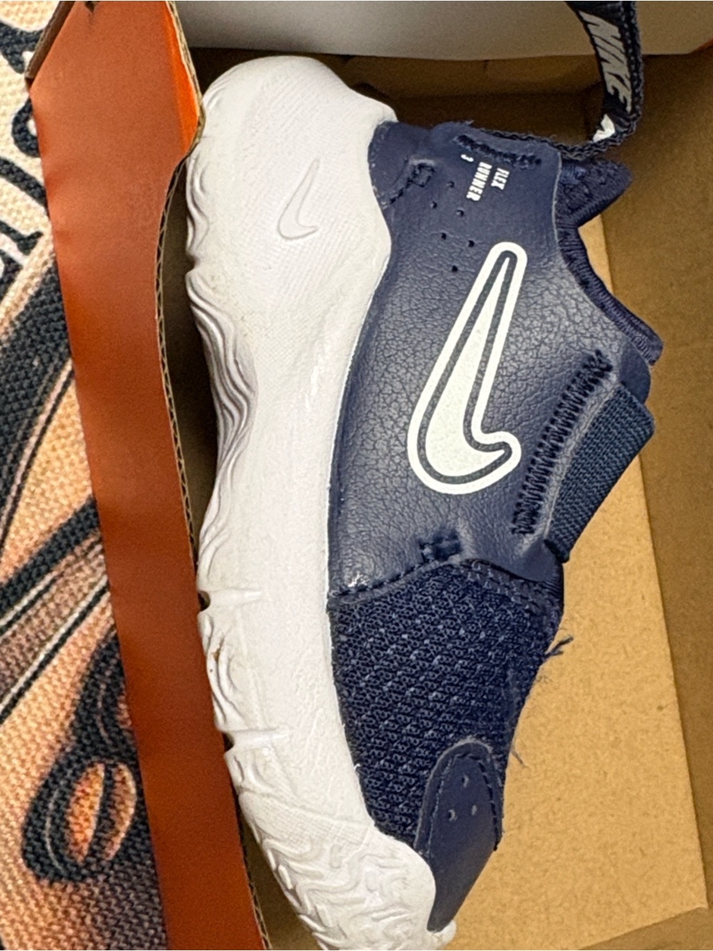 Nike Kids Navy and White Slip-On Sneaker